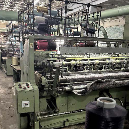 Fabric weaving machine