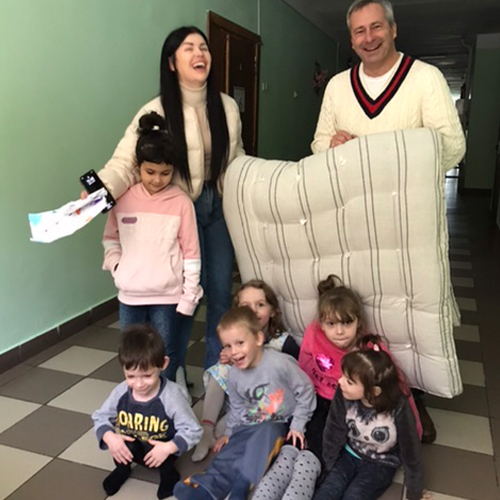 happy orphans receive a mattress