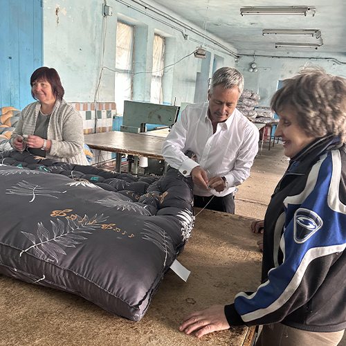 Women making mattresses